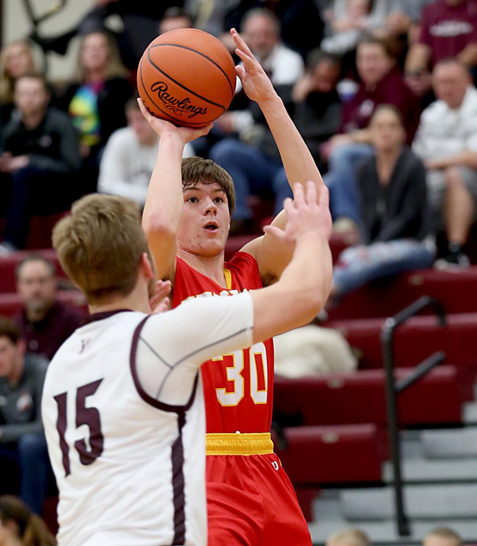 Fenwick guard John Engelmeier connects for two points over Lebanon forward Sam Abbott during their game at Lebanon on Saturday night. CONTRIBUTED PHOTO BY E.L. HUBBARD