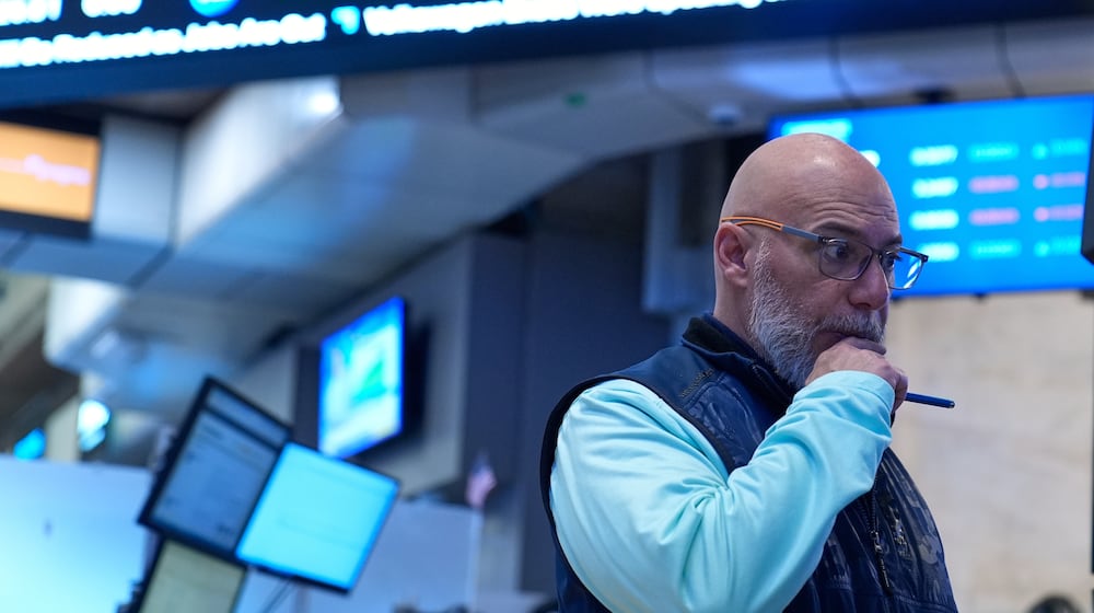 Traders work on the floor at the New York Stock Exchange in New York, Tuesday, March 10, 2026. (AP Photo/Seth Wenig)