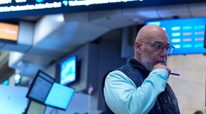 Traders work on the floor at the New York Stock Exchange in New York, Tuesday, March 10, 2026. (AP Photo/Seth Wenig)