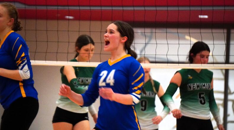 Middletown Christian's Maya Chernesky celebrates a point against New Miami on Thursday night at Princeton. Chris Vogt/CONTRIBUTED