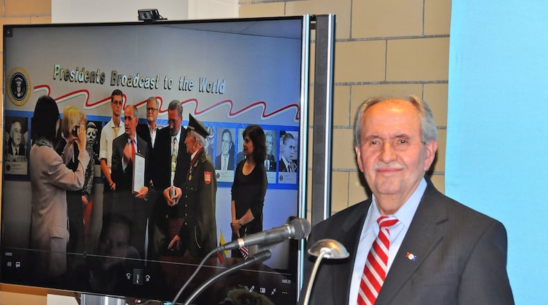 Elez Biberaj, Voice of America (VOA) Eurasia division chief, listens to an audience question after his Nov. 6 talk at the National VOA Museum of Broadcasting. He spoke about challenges VOA journalists face and Russian disinformation. CONTRIBUTED/VOA Museum Photo