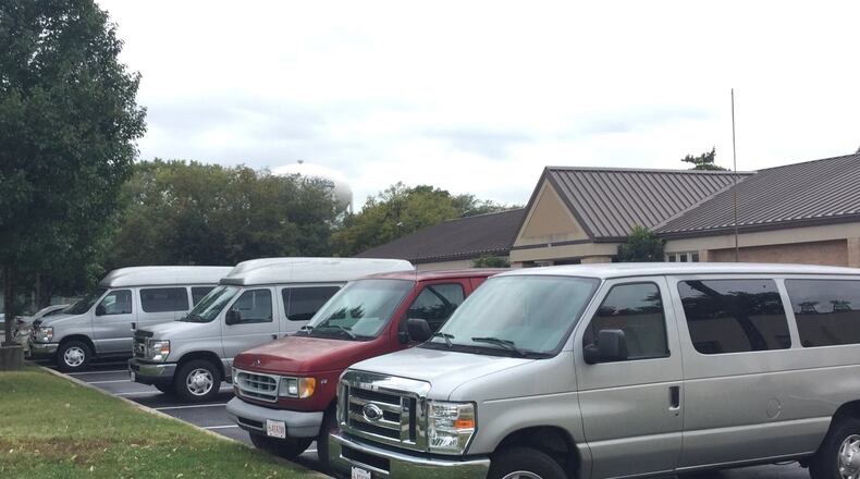 Pictured are some of the Warren County Board of Developmental Disabilities vans that were repaired for free by Safelite AutoGlass. The windshields of the vans had been smashed out by vandals. CONTRIBUTED