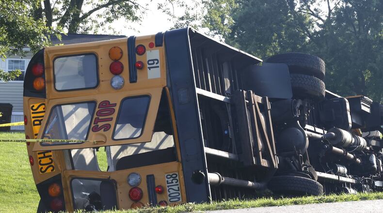 At least one person was killed after a Northwestern school bus was involved in a crash on Route 41 in German Twp. Tuesday, Aug. 22, 2023. BILL LACKEY/STAFF