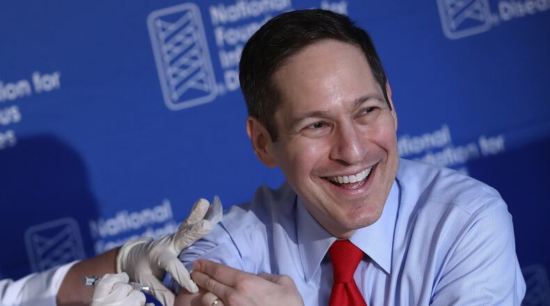 Dr. Tom Frieden, director of the Centers for Disease Control and Prevention, receives his annual flu shot during a press conference Sept. 29, 2016 in Washington, DC. Frieden took part in the news conference to highlight that millions of people get sick, hundreds of thousands are hospitalized and thousands to tens of thousands of people die from flu and related complications every year. (Photo by Win McNamee/Getty Images)