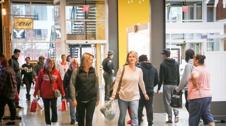 Shoppers walk through the Foundry at Liberty Center as they shop on Black Friday, Nov. 25, 2016. GREG LYNCH / STAFF