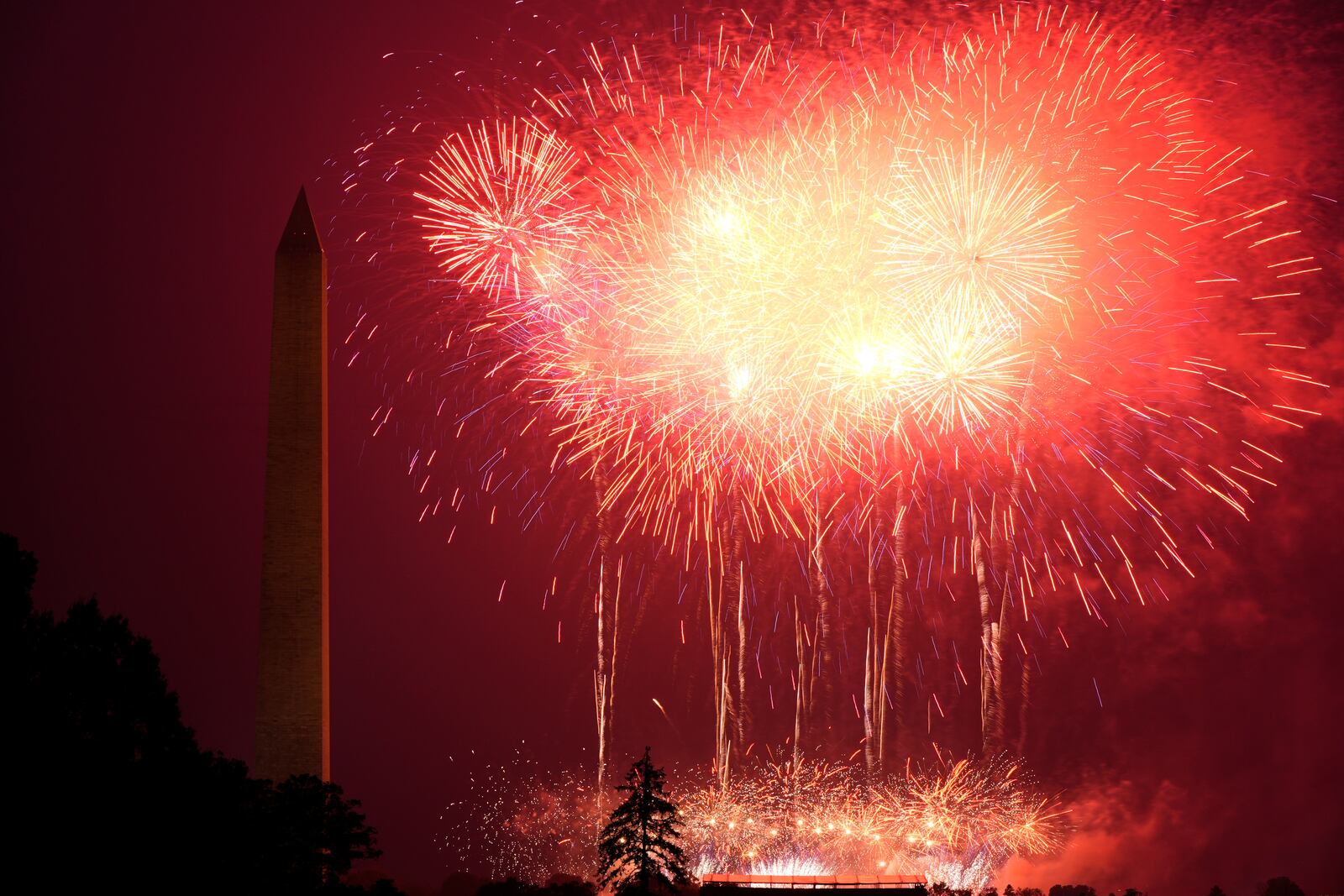 Fireworks burst over the Ellipse during an event to honor the Army's 250th anniversary, coinciding with President Donald Trump's 79th birthday, Saturday, June 14, 2025, in Washington. (AP Photo/Mark Schiefelbein)