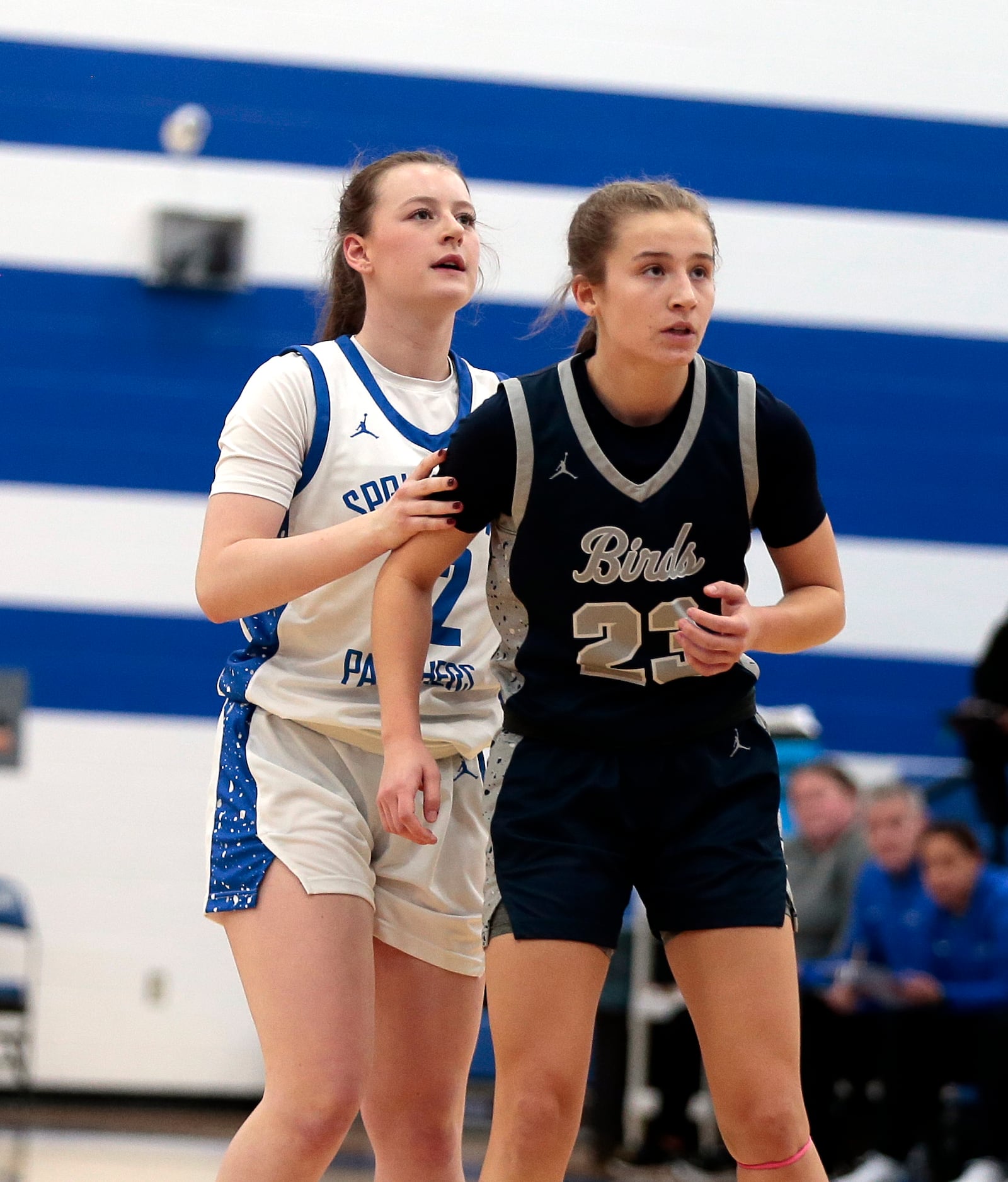 Springboro sophomore Amielia Johnson watches her shot go up as Fairmont junior Peyton Adams guards against a rebound attempt during a game on Wednesday, Dec. 10, 2025 in Springboro. STEVEN WRIGHT / STAFF