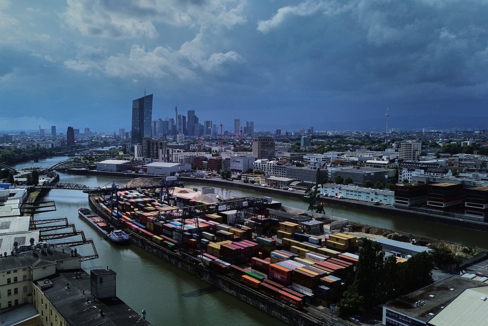 Containers are piled in a cargo terminal in Frankfurt, Germany, Monday, July 14, 2025. (AP Photo/Michael Probst)