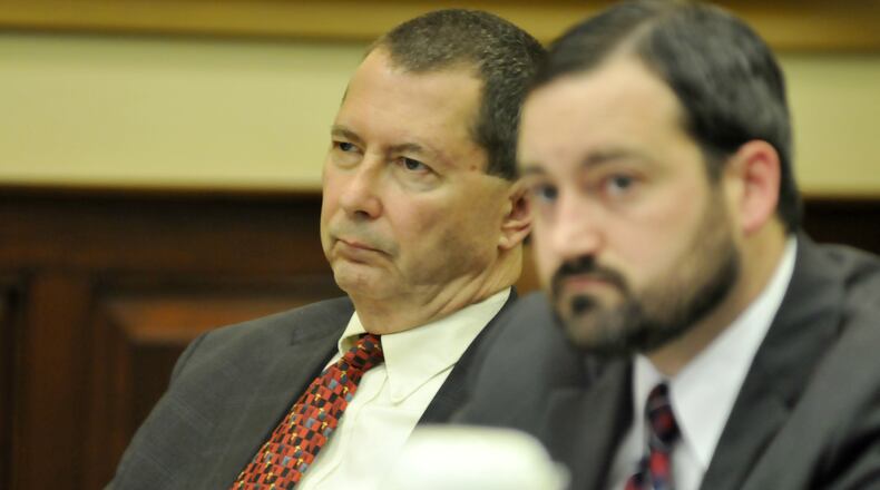 The First District Court of Appeals overturned 10 of 13 criminal counts against former state lawmaker Pete Beck. Pictured is Beck at the defense table with defense attorney Chad Ziepfel on May 26, 2015, during Beck’s criminal trial in a Hamilton County Common Pleas courtroom in Cincinnati.