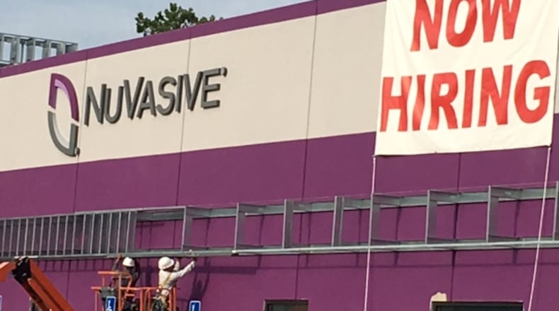 NuVasive Inc., which announced a move from Fairborn to West Carrollton in late 2015 as part of a $45 million expansion, has been looking for qualified workers. NICK BLIZZARD/PHOTO