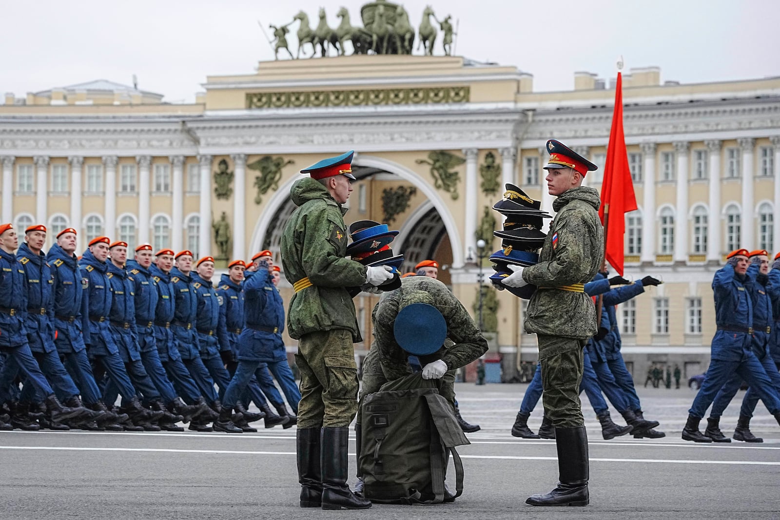 Honour guard soldiers pack caps after a rehearsal for the Victory Day military parade, which will take place at Dvortsovaya (Palace) Square on May 9 to celebrate 80 years after the victory in World War II, in St. Petersburg, Russia, Tuesday, April 22, 2025. (AP Photo/Dmitri Lovetsky)