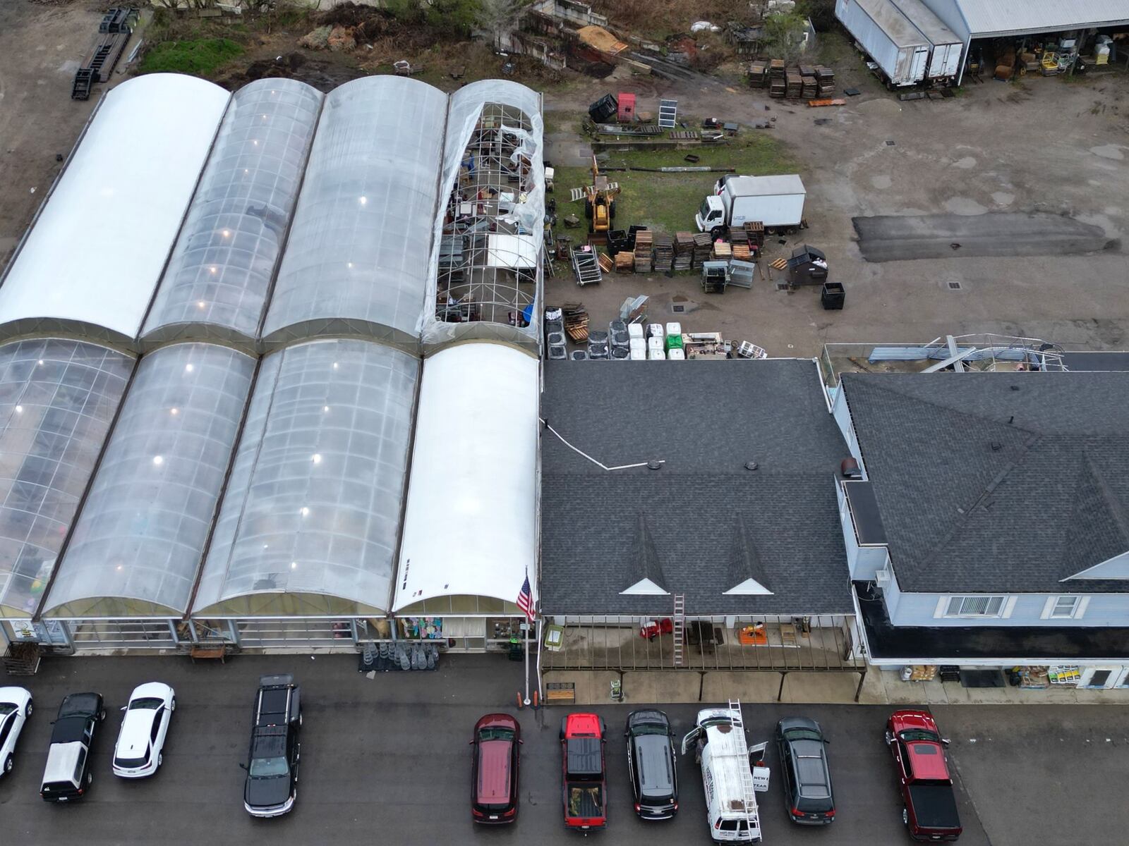 A greenhouse at Couch's Garden Center in St. Clair Township was damaged by storms overnight. NICK GRAHAM/STAFF