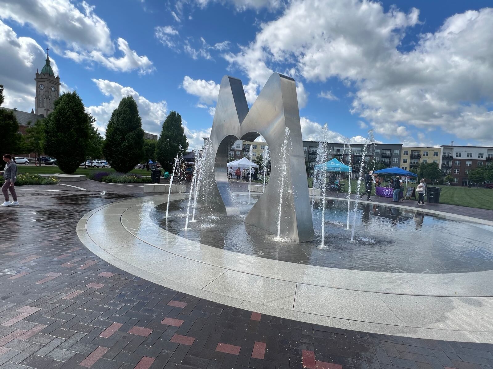 The Marcum Park "M" Fountain is open for the season. Hours are 11 a.m.-7 p.m. Pictured is the first Hamilton Flea of 2024 held May 11 at Marcum Park.  AMY BURZYNSKI/STAFF