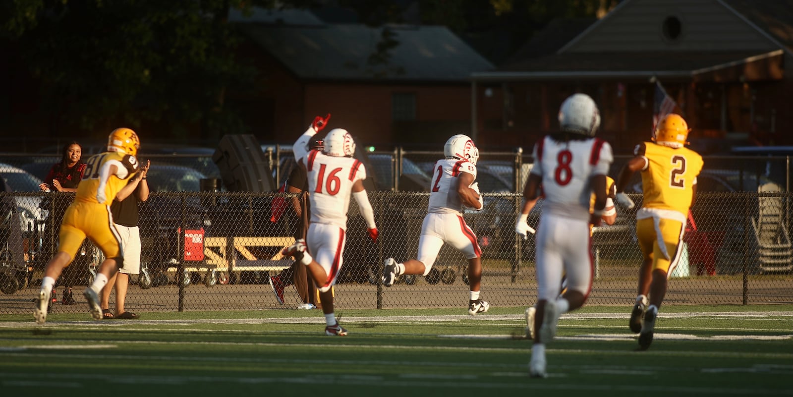 Trotwood-Madison's Darius Dennis returns an interception for a touchdown in the opening minutes of the first quarter against Alter on Friday, Sept. 12, 2025, at Roush Stadium in Kettering. David Jablonski/Staff