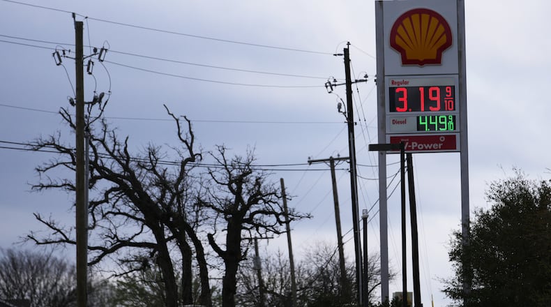 Gas prices are seen on a Shell station marqee Monday, March 9, 2026, in Arlington, Texas. (AP Photo/Julio Cortez)