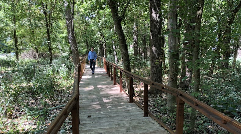 A lone walker tries out the boardwalk at the Ruder Preserve. The Three Valley Conservation Trust held a ribbon cutting for the walkway Oct. 6 but it had been completed and available for use before that. CONTRIBUTED