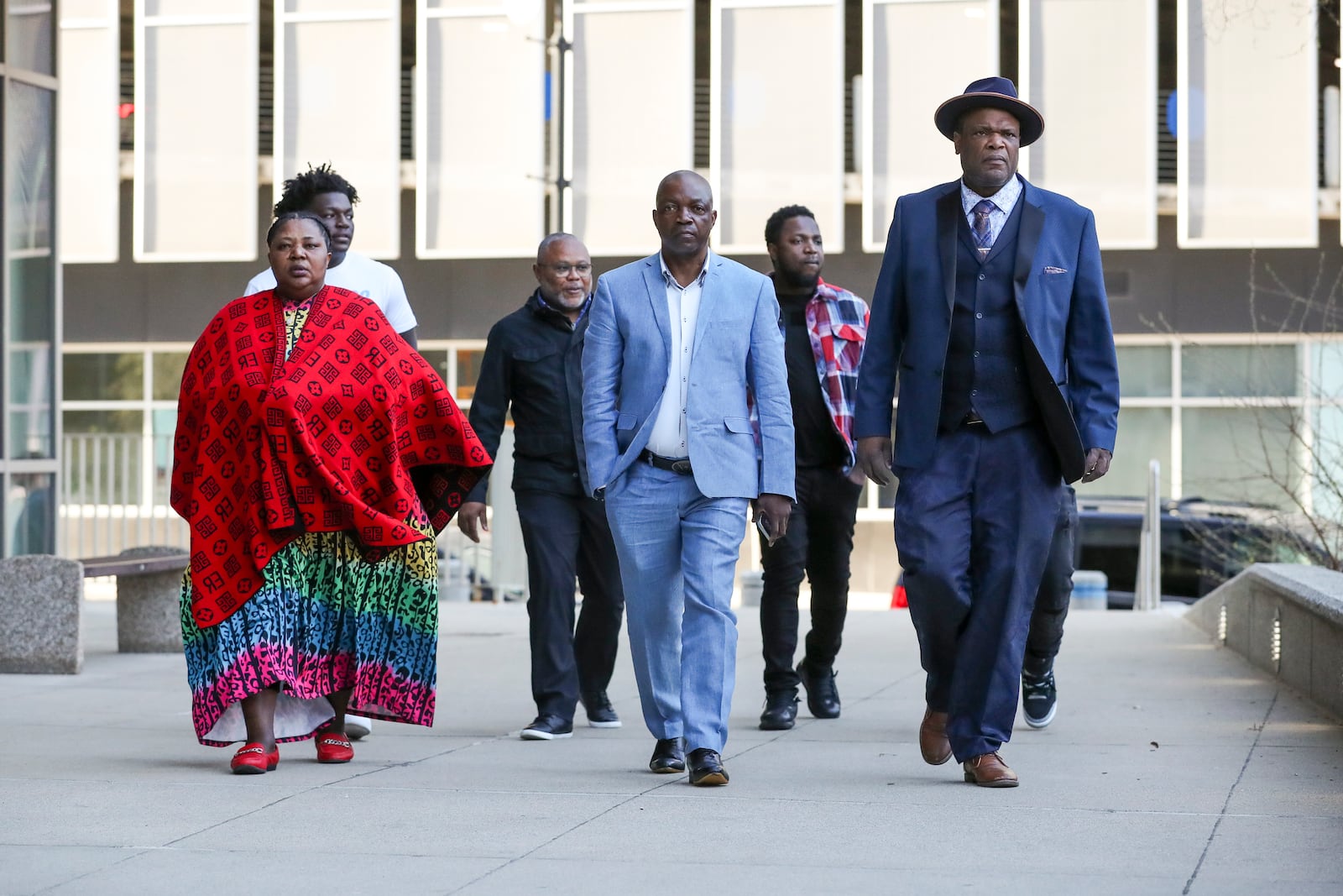 The family of Patrick Lyoya and Kent County commissioner Robert Womack, right, arrive outside the Kent County Courthouse in Grand Rapids, Mich., Monday, April 28, 2025. (Chris duMond/Detroit News via AP)