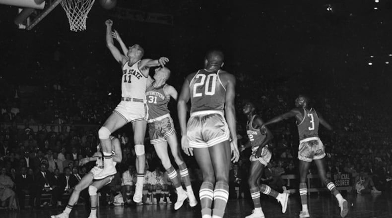 Coached by Fred Taylor, the 25-3 Buckeyes - which included future Hall of Famers John Havlicek, Bob Knight and Jerry Lucas - steamrolled through the NCAA tournament by an average of 19.5 points a game en route to their only national championship.