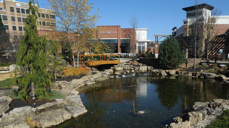 Miami Twp.'s first Designated Outdoor Refreshment Area, or DORA, will operate daily from 4 to 11 p.m. at the 96-acre Austin Landing complex. STAFF FILE PHOTO