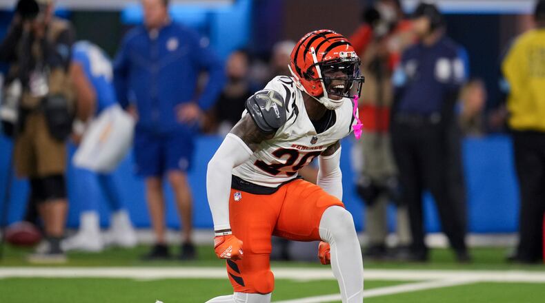 Cincinnati Bengals cornerback Cam Taylor-Britt (29) celebrates after a defensive stop during the first half of an NFL football game against the Los Angeles Chargers, Sunday, Nov. 17, 2024, in Inglewood, Calif. (AP Photo/Eric Thayer)