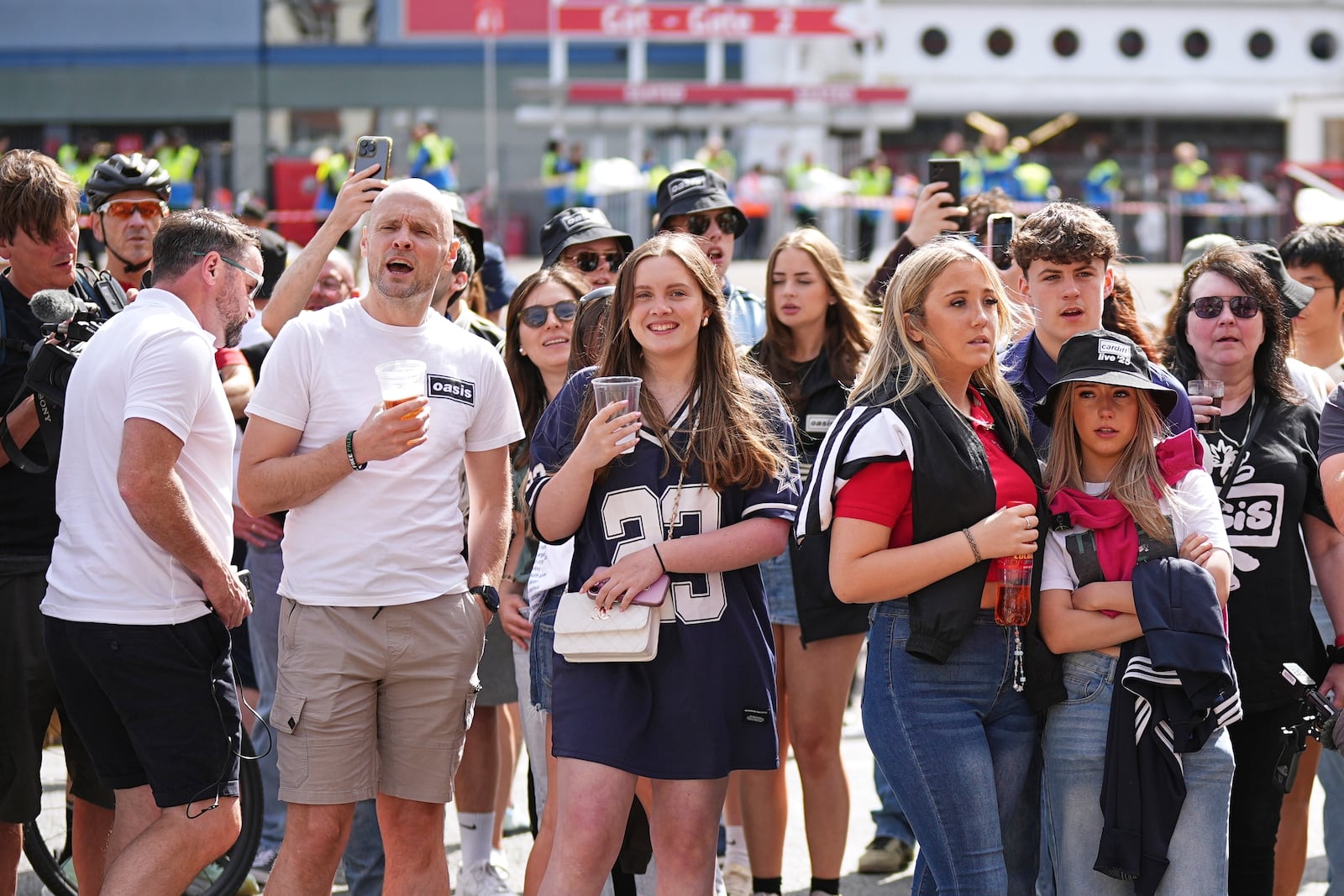 Fans gather for the Oasis reunion concert on Friday, July 4, 2025, in Cardiff. (Photo by Scott A Garfitt/Invision/AP)