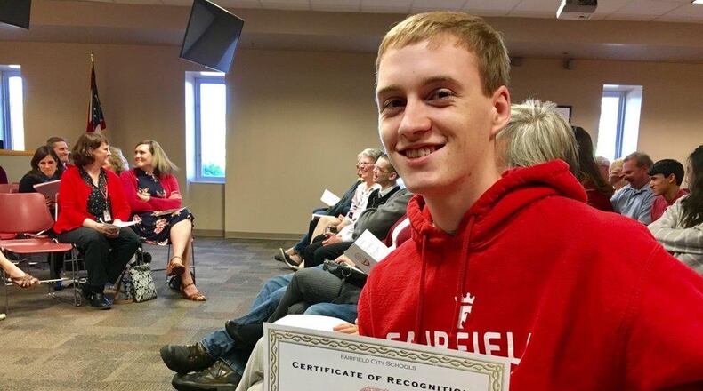 Graduating Fairfield High School senior Jeremy Zambo was among the 16 top academic performers honored by school district officials Monday during an academic signing ceremony. Zambo plans to study mathematics at Miami University. MICHAEL D. CLARK/STAFF
