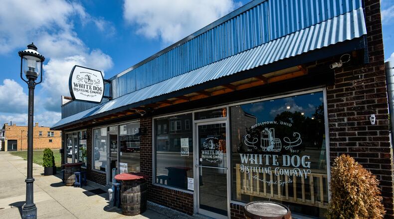 White Dog Distilling Company is open on Central Avenue in Middletown. The distillery and bar offers a full bar with a large selection of bourbons, cocktails, craft beers and live music on some nights. Their house-made agave spirit, vodka, rum and gin are also available to purchase at the bar or by the bottle. NICK GRAHAM/STAFF