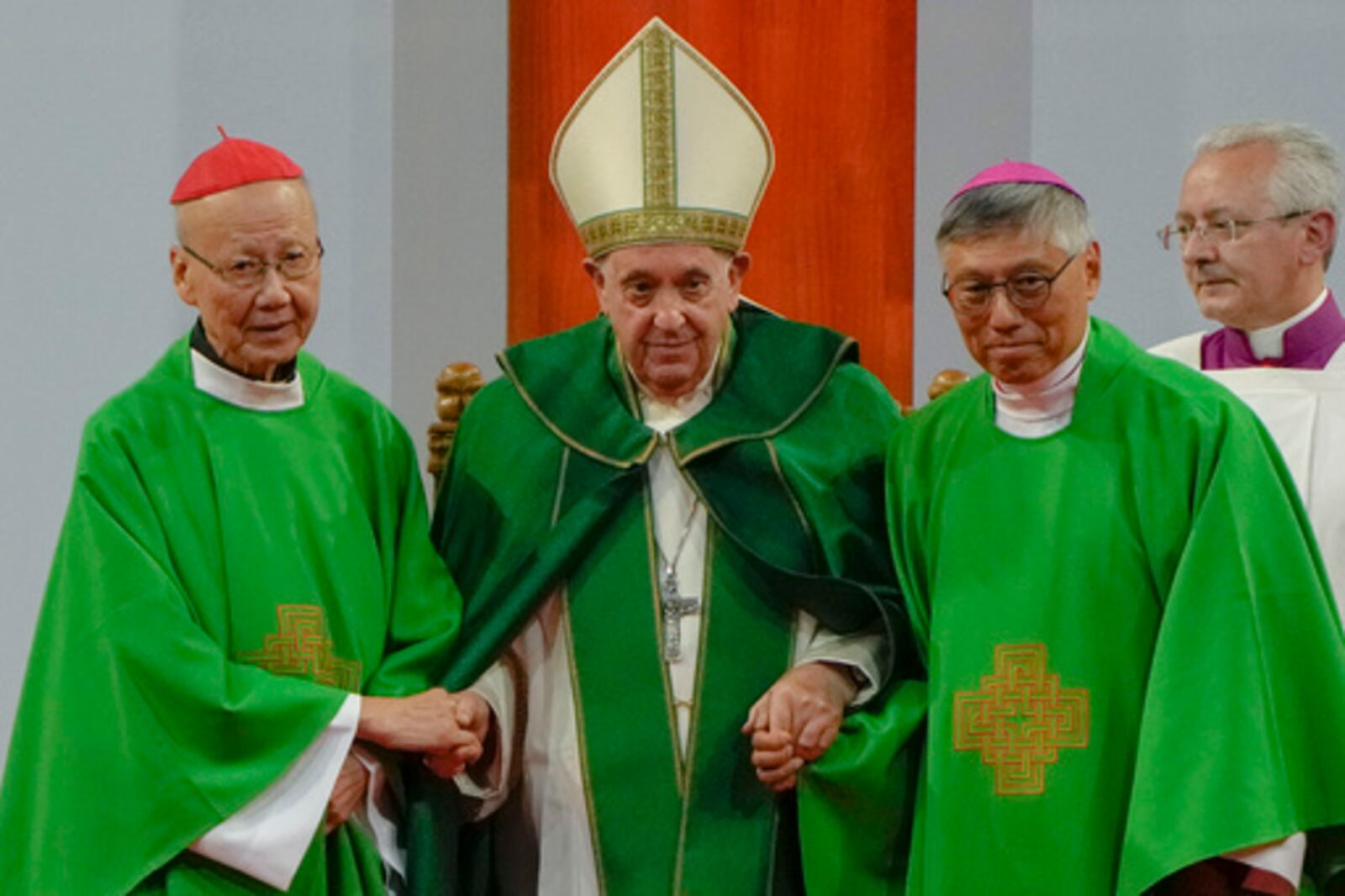 FILE - Pope Francis is joined by Cardinal John Tong Hon, left, and Cardinal-elect Stephen Chow, both from Hong Kong, after presiding over a mass at the Steppe Arena in the Mongolian capital Ulaanbaatar, Sunday, Sept. 3, 2023. (AP Photo/Ng Han Guan, File)