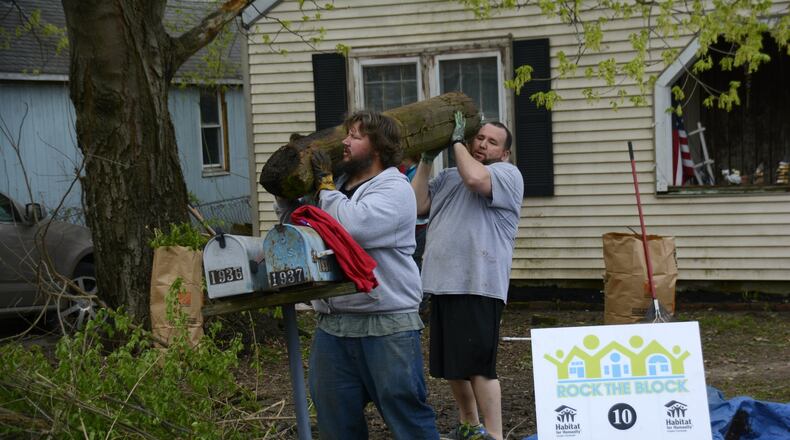 On the heels of Habitat for Humanity’s Rock the Block in April, Fairfield Twp. will hold its 10th annual spring cleanup day on June 1. Pictured is activity from the April 13, 2019, Rock the Block event were more than 11 Dumpters were filled with trash and debris. MICHAEL D. PITMAN/FILE