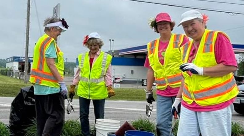 Village and Farm Garden Club members are seen here doing beautification work on U.S. 27 in Ross. CONTRIBUTED