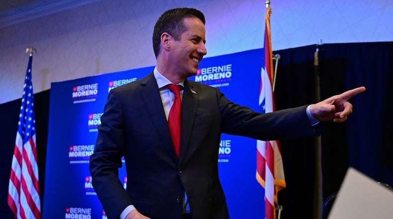 Cleveland businessman Bernie Moreno, a Republican candidate for U.S. Senate points to the crowd during his primary election night watch party in Westlake, Ohio, Tuesday, March 19, 2024. (AP Photo/David Dermer)