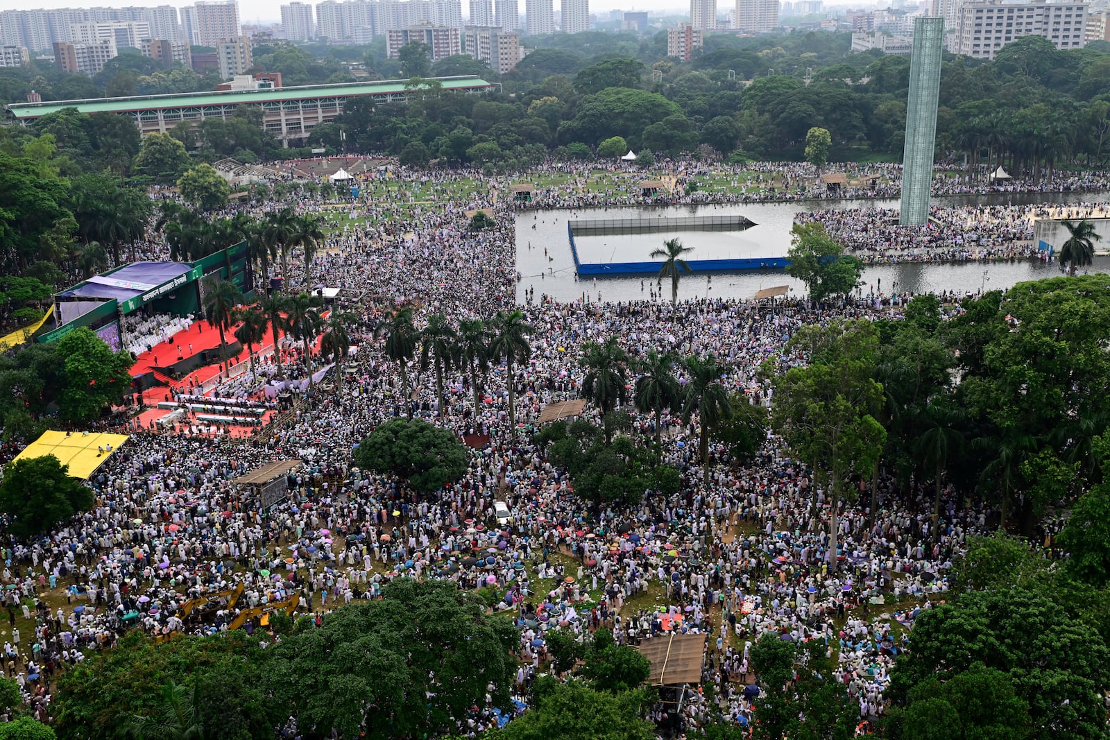 Thousands of supporters of Bangladesh's largest Islamist party Jamaat-e-Islami attend a rally in a show of strength ahead of elections expected next year, in Dhaka, Bangladesh, Saturday, July 19, 2025. (AP Photo/Mahmud Hossain Opu)