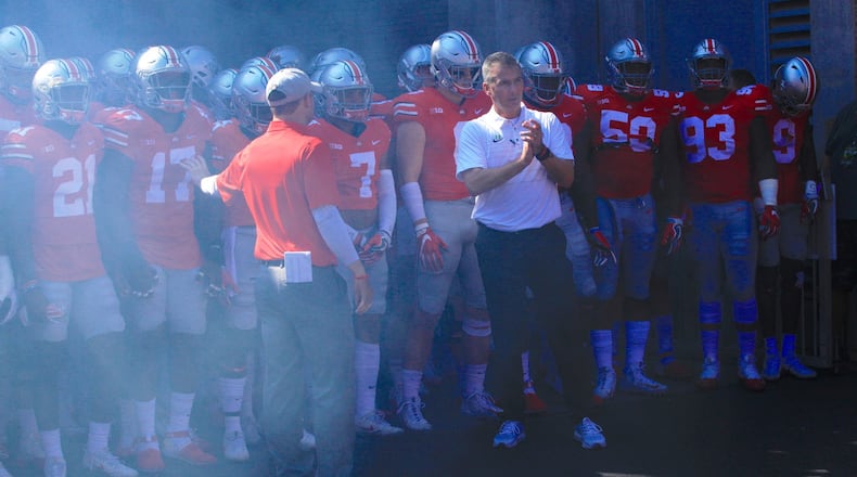 Ohio State’s Urban Meyer waits to lead the team onto the field before a game against UNLV on Saturday, Sept. 23, 2017, at Ohio Stadium in Columbus. David Jablonski/Staff