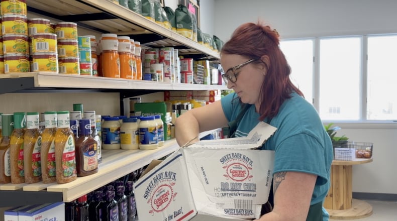 Grayson Lee is the pantry supervisor at The Market at Shared Harvest Foodbank. She said visitors receive a shopping list of items they can select from during their visit. WCPO/CONTRIBUTED