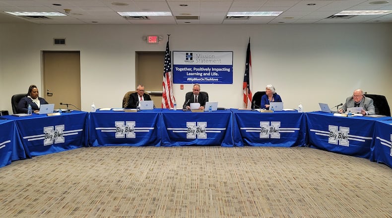 Hamilton School Board members, left to right, Shaquila Mathews, Dave Davidson, Laurin Sprague, Margaret Baker and Stece Isgro participate in a meeting Thursday, Jan. 13, 2022 in Hamilton. NICK GRAHAM / STAFF