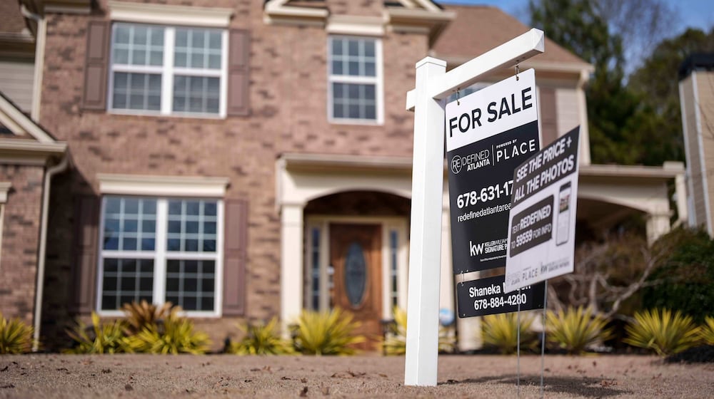 FILE - A "For Sale" sign is displayed outside a home, Feb. 1, 2024, in Aceworth, Ga. (AP Photo/Mike Stewart, File)