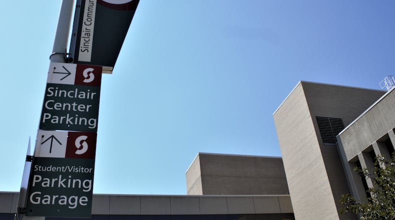 Fourteen students will be able to go to college for free at Sinclair because of General Motors scholarship.