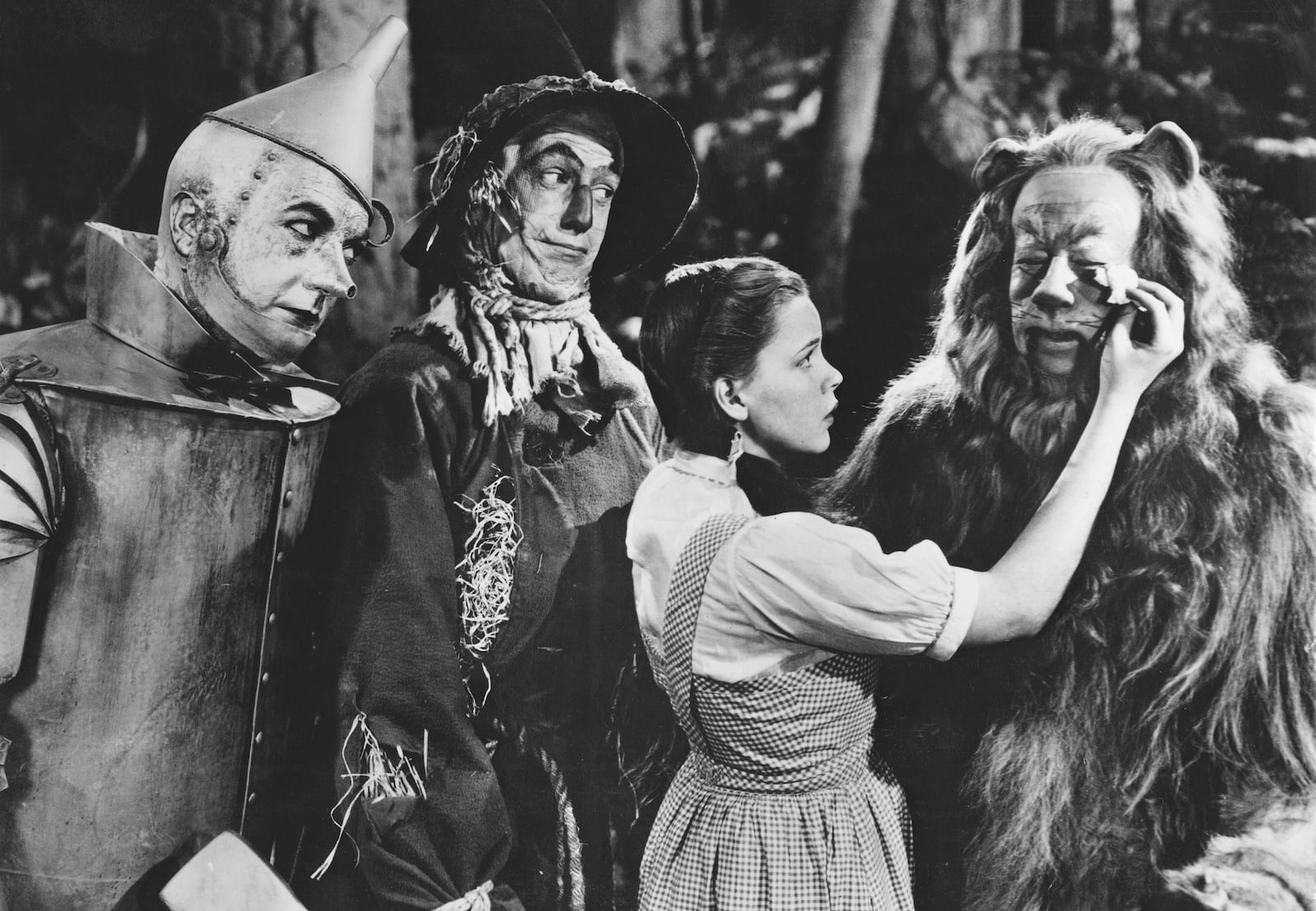 From left to right, Jack Haley as the Tin Man, Ray Bolger as the Scarecrow, Judy Garland as Dorothy and Bert Lahr as the Cowardly Lion in the MGM film 'The Wizard of Oz', 1939. (Photo by Authenticated News/Archive Photos/Getty Images)