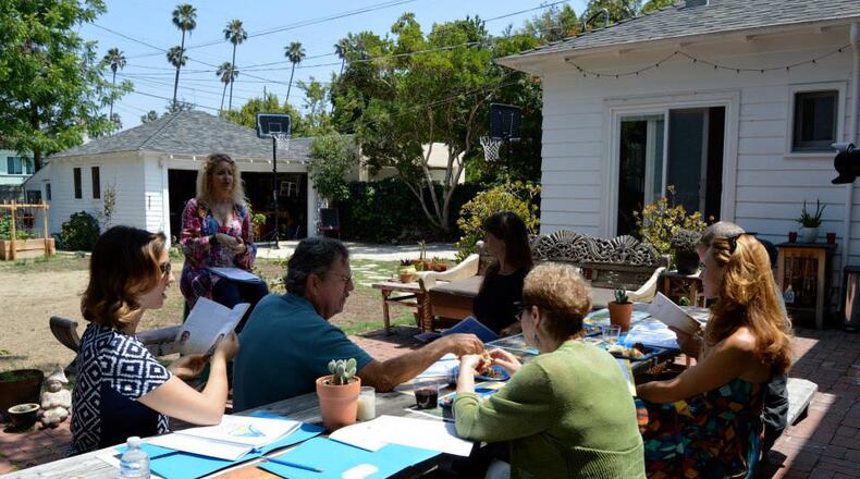Amy Pickard speaks during a death party in Dayton about her business Good To Go! that focuses on end of life planning. CONTRIBUTED