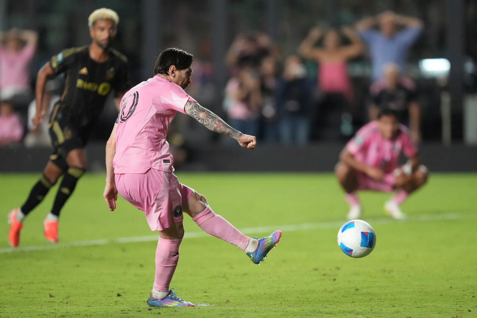 Inter Miami forward Lionel Messi (10) scores on a penalty kick against the Los Angeles FC during the second half of a CONCACAF Nations League Quarterfinal Match at Chase Stadium, Wednesday, April 9, 2025 in Fort Lauderdale, Fla. (AP Photo/Jim Rassol)