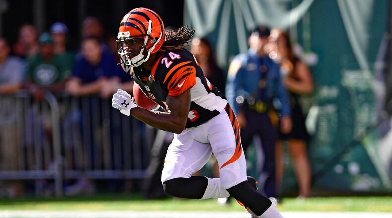 EAST RUTHERFORD, NJ - SEPTEMBER 11: Adam Jones #24 of the Cincinnati Bengals returns the kickoff against the New York Jets during the fourth quarter at MetLife Stadium on September 11, 2016 in East Rutherford, New Jersey. The Cincinnati Bengals defeated the New York Jets 23-22. (Photo by Steven Ryan/Getty Images)