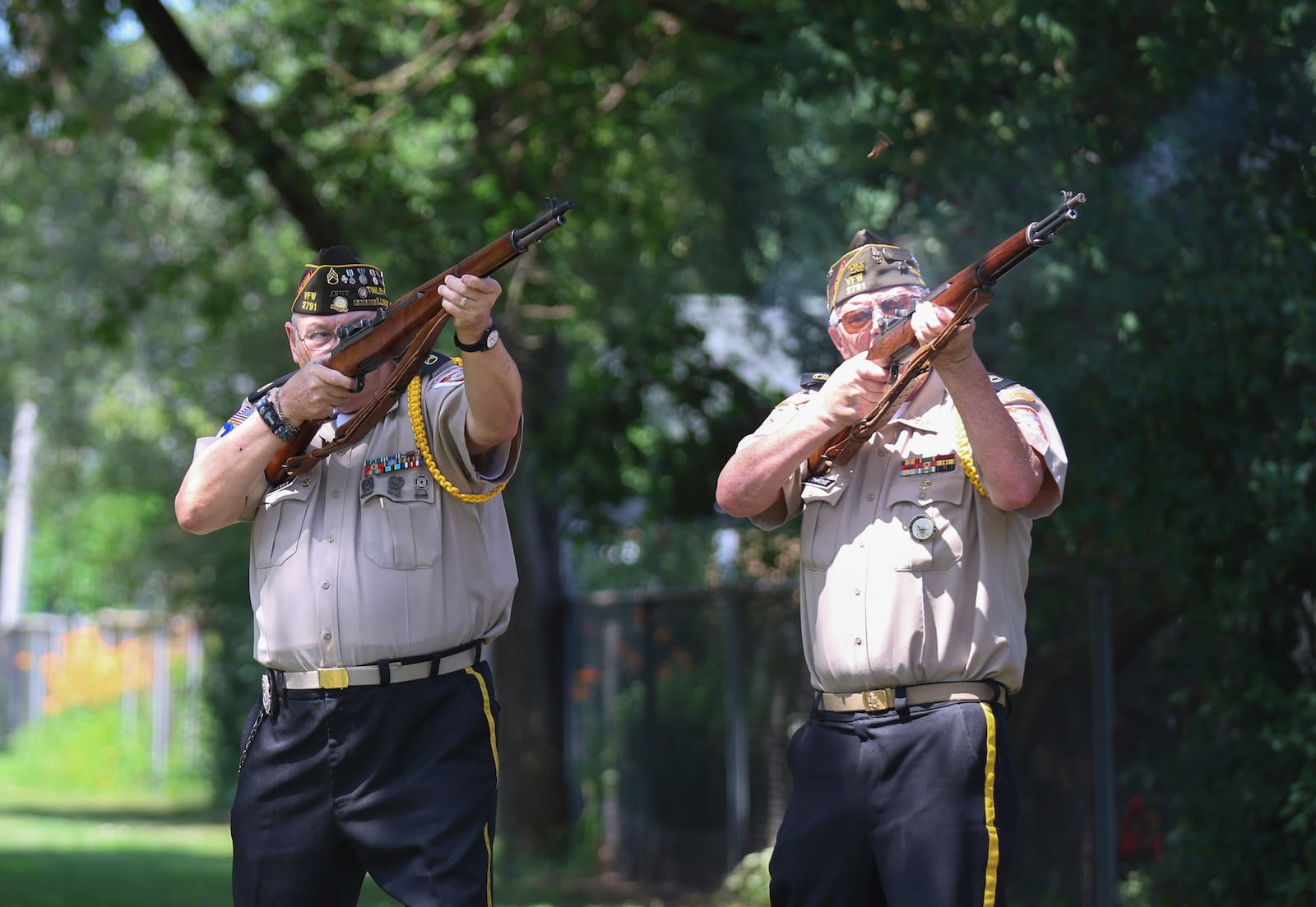 Robert Jensen and Mark Ethridge, right, of the Veterans of Foreign Wars Post 2791, perform a 21-gun salute during a military funeral for 75-year-old Pfc. Reba C. Bailey, a former missing person cold case named Seven Doe, Tuesday, July 1, 2025, at Mount Olivet Catholic Cemetery in Chicago. (AP Photo/Talia Sprague)