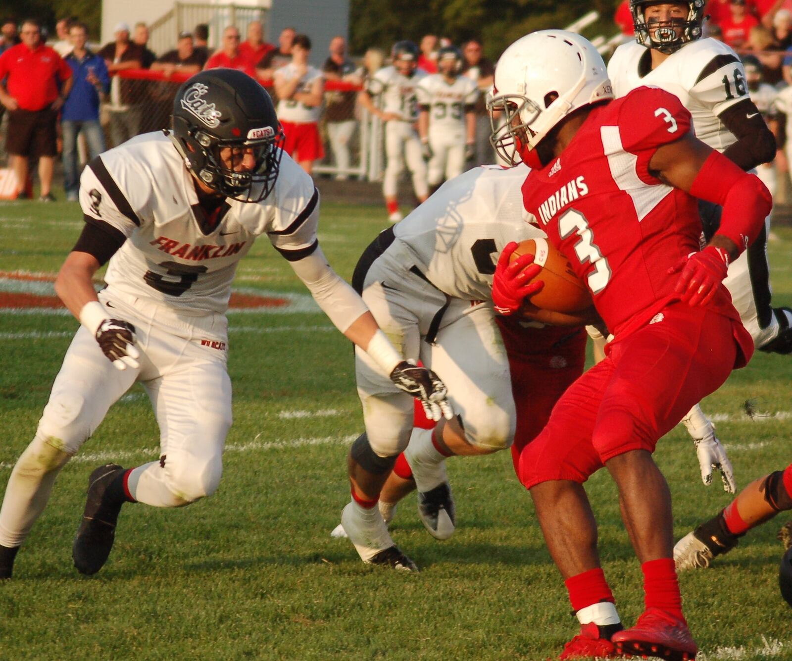 Franklin’s Kyle Rickard (3) moves in to make a tackle on Carlisle’s D.J. Chambers on Aug. 25 during the visiting Wildcats’ 47-14 triumph at Laughlin Field. CONTRIBUTED PHOTO BY JOHN CUMMINGS