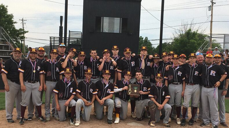 The Ross Rams pose with their hardware Monday after defeating Tippecanoe 6-3 at Mason to repeat as Division II district champions. RICK CASSANO/STAFF