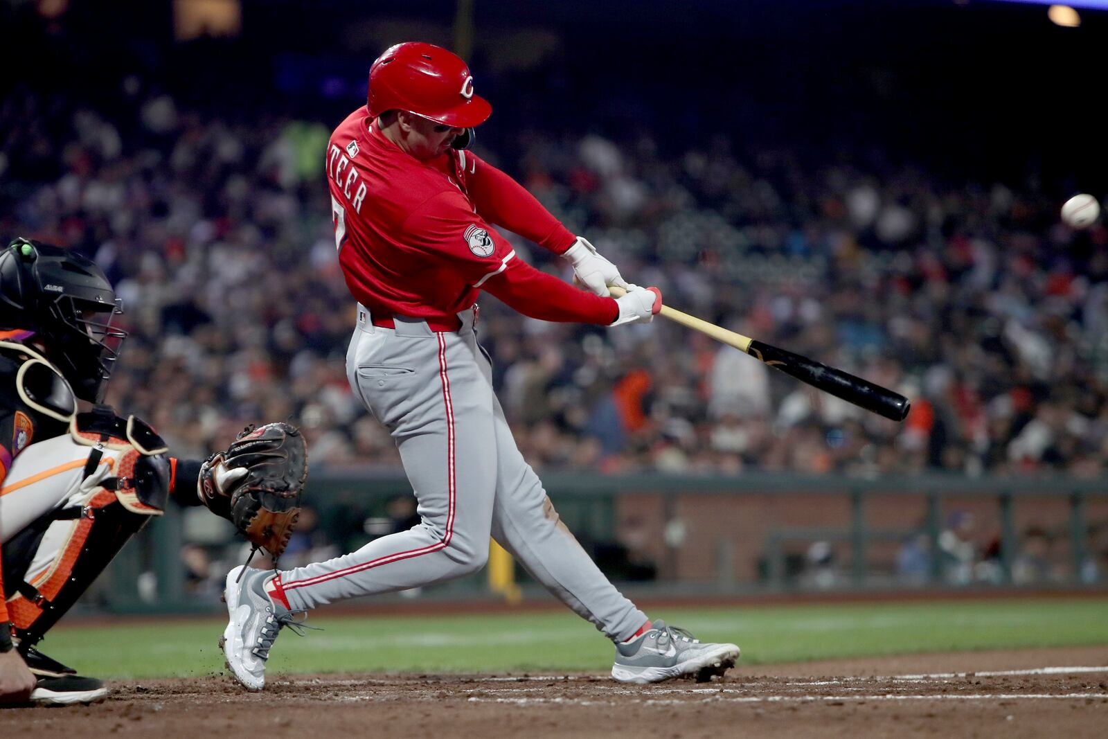 Cincinnati Reds designated hitter Spencer Steer (7) flys out in the seventh inning of a baseball game against the San Francisco Giants in San Francisco, Tuesday, April 8, 2025. (AP Photo/Scot Tucker)