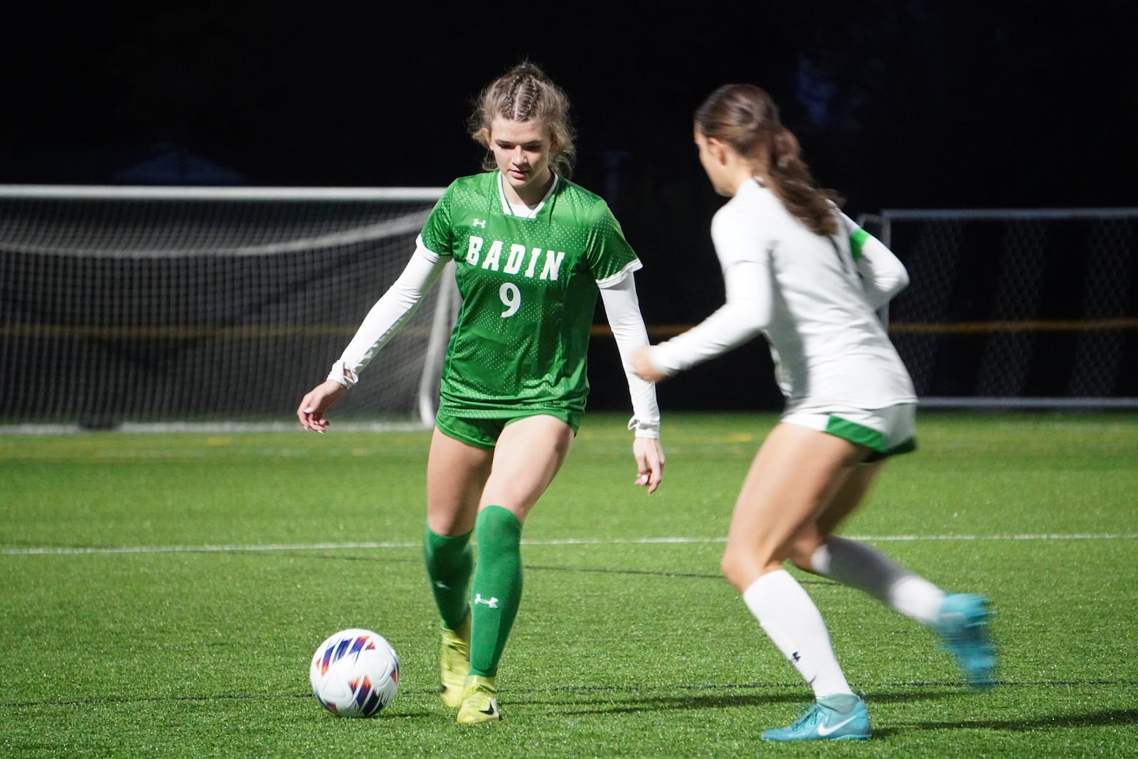Badin’s Daniele Birri (9) looks for a passing lane against McNicholas on Tuesday night in a Division III regional semifinal at Centerville. CHRIS VOGT / CONTRIBUTED