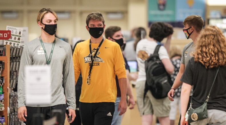 Wright State University will continue its hybrid model that combines in-person, remote and flexible instruction in the spring semester. About 70% of the instruction will be remote. JIM NOELKER/Staff