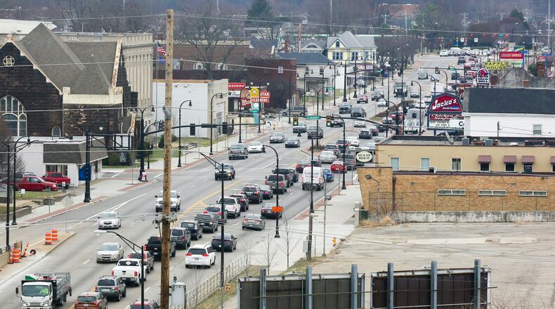 The timing of traffic signals on High and Main streets will be updated to give east-west drivers an extra 20 seconds of “green time.” GREG LYNCH/STAFF