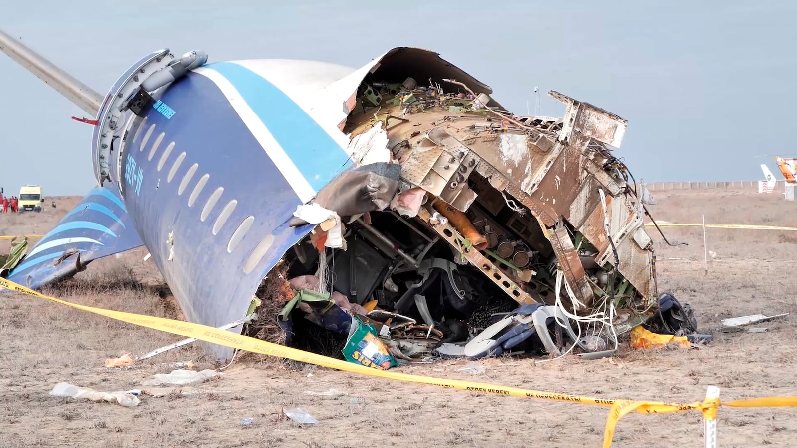 FILE - In this photo taken from a video released by The Administration of Mangystau Region, the wreckage of Azerbaijan Airlines Embraer 190 lies near the airport of Aktau, Kazakhstan, on Dec. 25, 2024. (The Administration of Mangystau Region via AP)