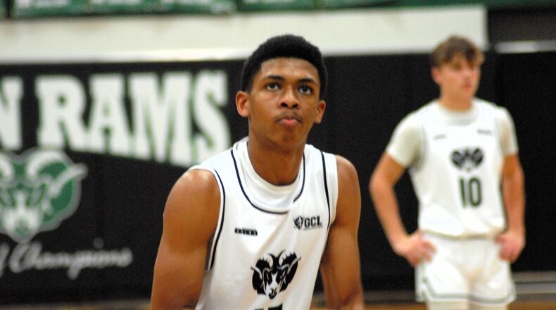 Badin's Chandler Taylor (15) eyes the rim during a free throw attempt against Roger Bacon on Saturday. Chris Vogt/CONTRIBUTED
